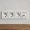 Nova IV trzy gniazda z gniazdem TV z białą ramką
